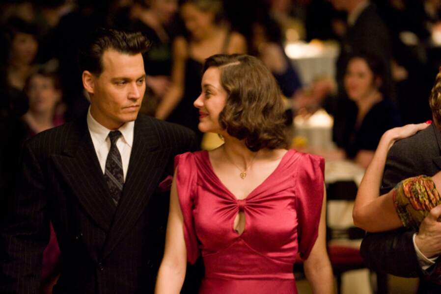 Elle joue la compagne du gangster John Dillinger (Johnny Depp) dans Public Enemies (2009) de Michael Mann.