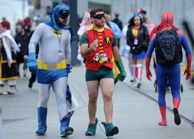 Batman et Robin soignent leur arrivée au Comic Con de New York.